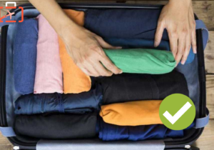 rolling clothes for luggage